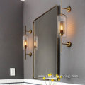 Long glass gold metal mesh wall light